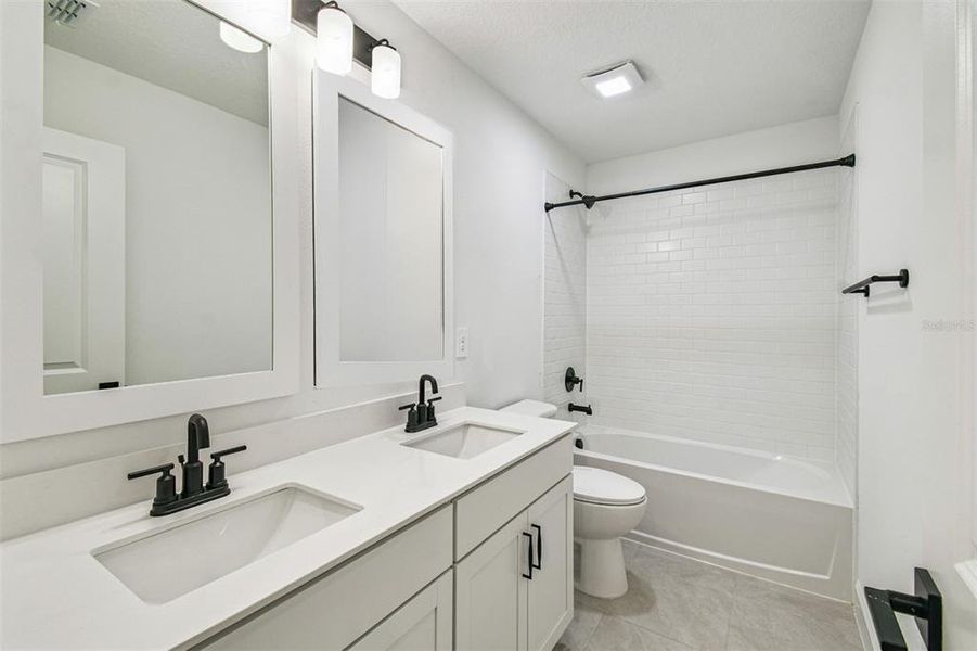 Furnished interior view inside a new home in Aspire at Canter Creek, Davenport (Image 9).