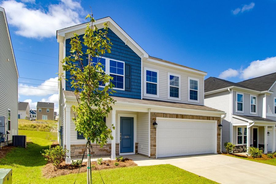 Front exterior of a new home in Ellington, Elgin, SC, highlighting curb appeal (Image 19).