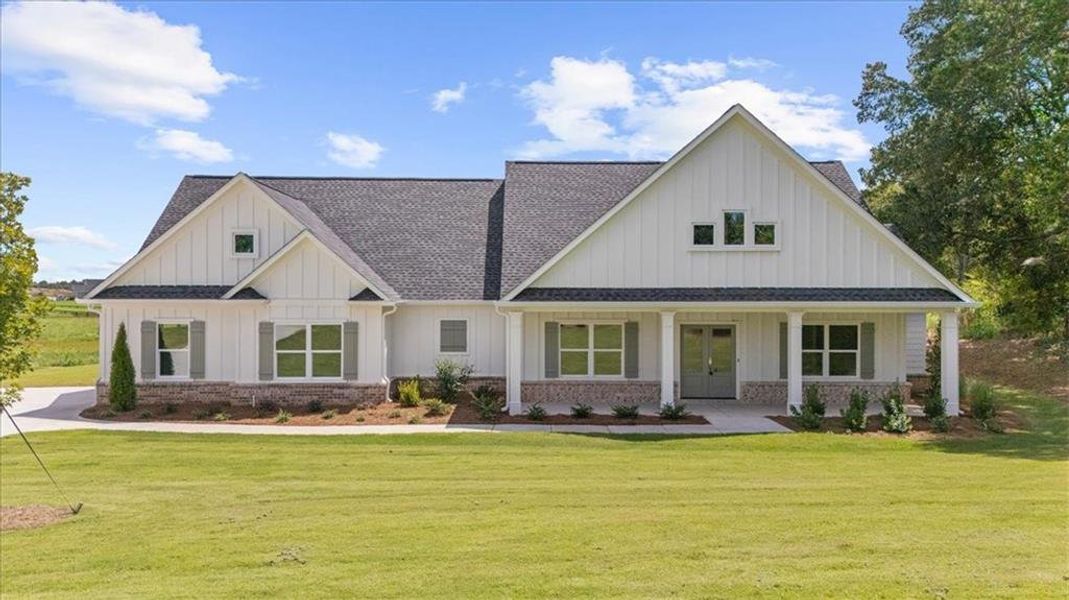 Front exterior of a new home in , Cumming, GA, highlighting curb appeal (Image 27).