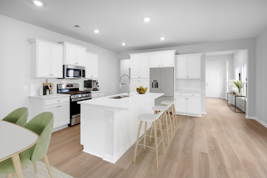 Furnished interior view inside a new home in Horizons at Carnes Crossroads | 55+: Cottage Collection, Summerville (Image 3). Furnished interior view inside a new home in Horizons at Carnes Crossroads | 55+: Cottage Collection, Summerville (Image 3).