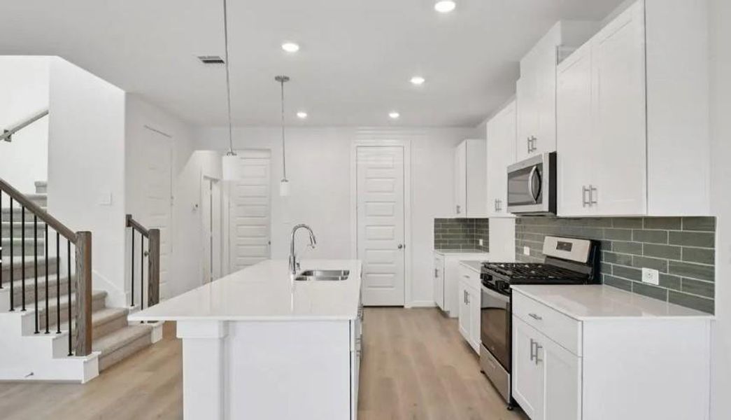 Photo is not of the actual home, but is an inspirational photo of builder’s model home and may depict options, furnishings, and/or decorator features that are not included