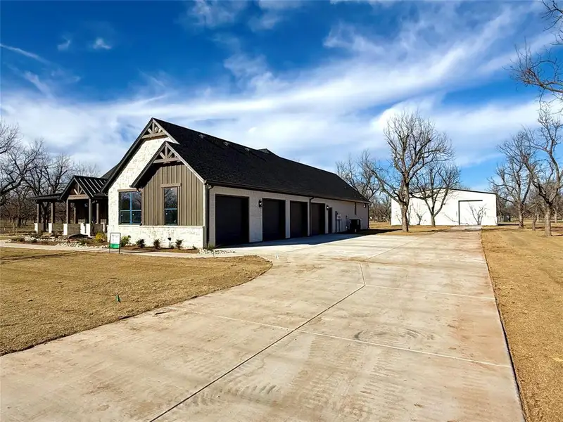 Exterior details and patio area of a home in , Granbury (Image 35). Exterior details and patio area of a home in , Granbury (Image 35).