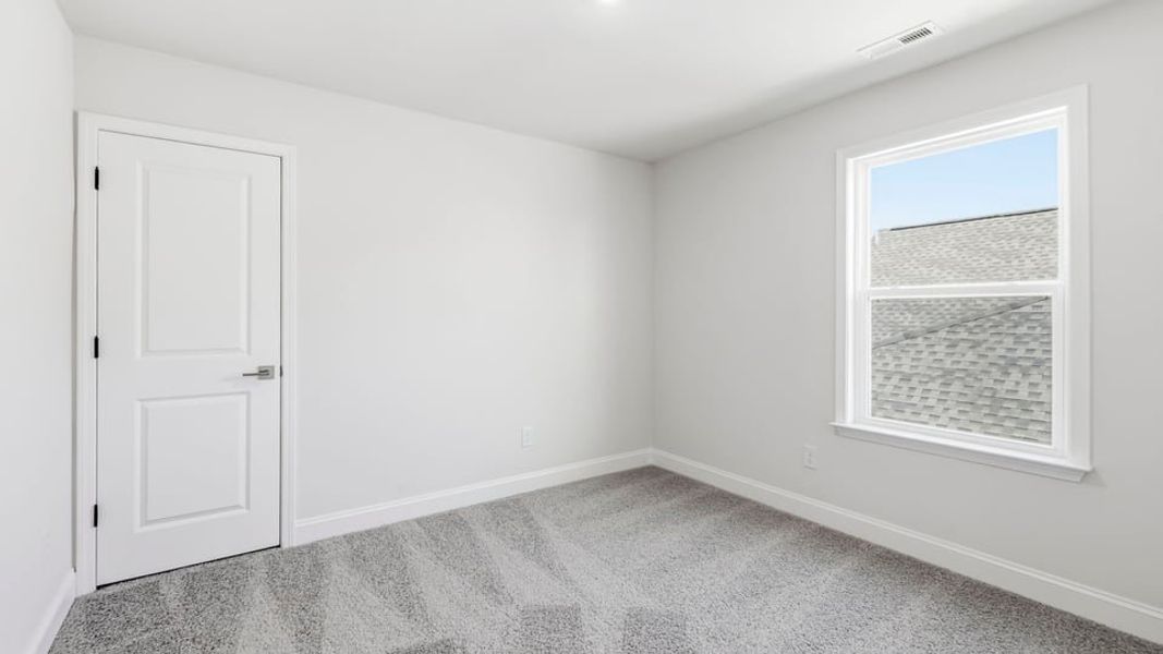 Spacious, unfurnished interior of a new home in Briargate, Fountain Inn (Image 29).