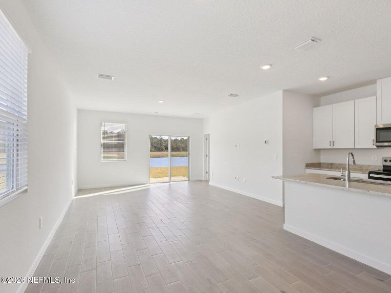 Spacious, unfurnished interior of a new home in Flagler Village - Classic Series, Palm Coast (Image 6). Spacious, unfurnished interior of a new home in Flagler Village - Classic Series, Palm Coast (Image 6).