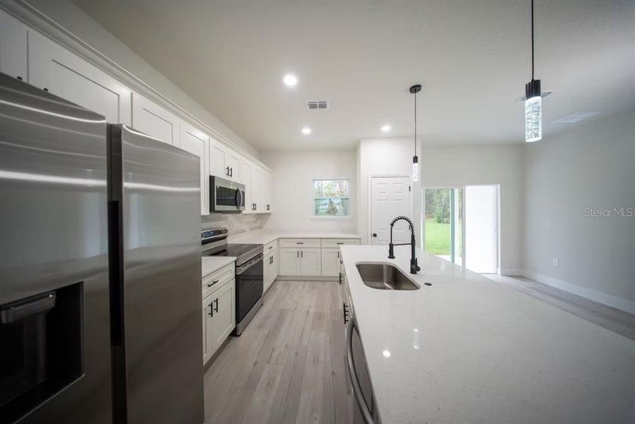 Furnished interior view inside a new home in , Citrus Springs (Image 8).
