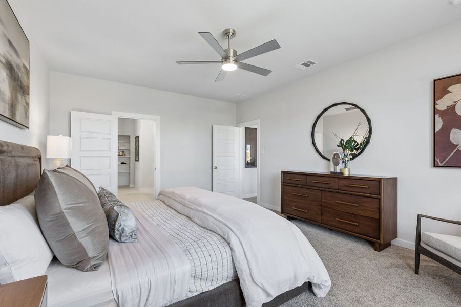 Primary Suite in a Sunset Ranch Winters Model Home in Gunter TX by Trophy Signature Homes