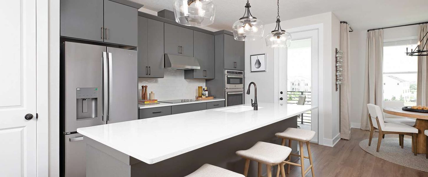 Representative furnished interior of a home built from the Haines II End Unit by Ashton Woods in Parkview at Hamlin, Winter Garden (Image 8).