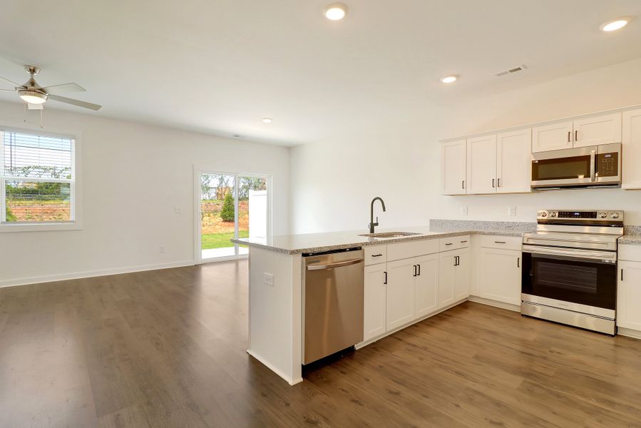 Representative furnished interior of a home built from the Ivey by Hunter Quinn Homes in Westgate Village Townes, Spartanburg (Image 11). Representative furnished interior of a home built from the Ivey by Hunter Quinn Homes in Westgate Village Townes, Spartanburg (Image 11).