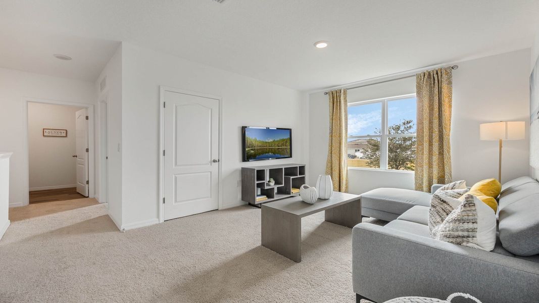 Furnished interior view inside a new home in Magnolia at the Bluffs Phase 3, Freeport (Image 15).