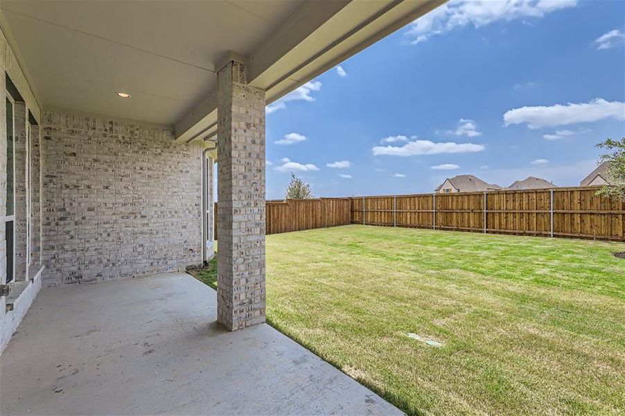 View of yard with a patio