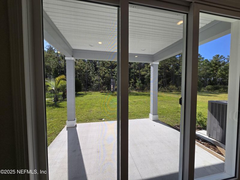 Exterior details and patio area of a home in Hyland Trail, Green Cove Springs (Image 26).