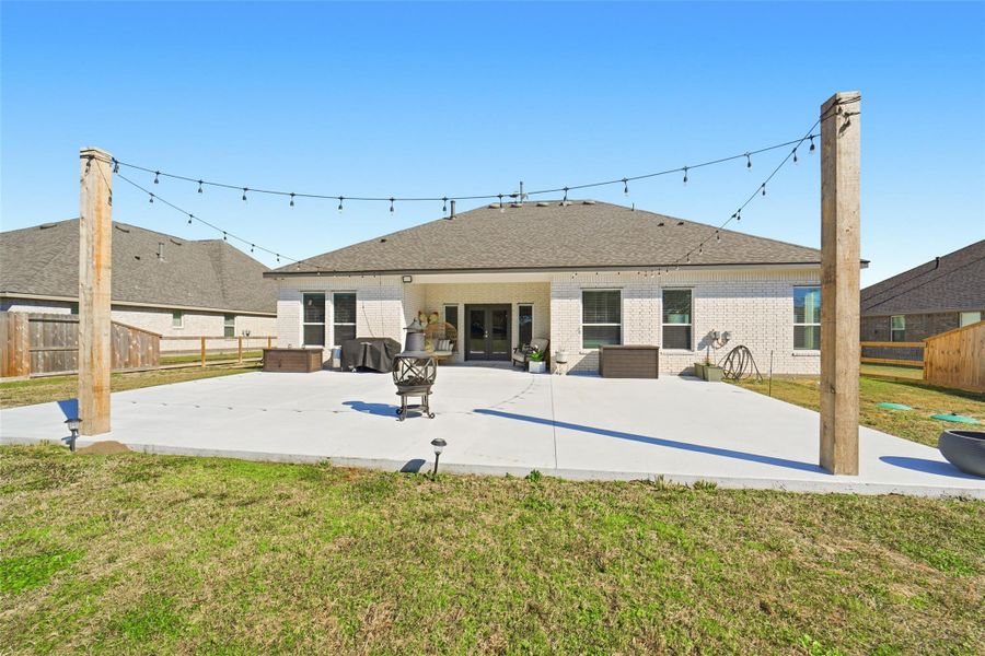 Exterior details and patio area of a home in Tejas Landing, Needville (Image 24).