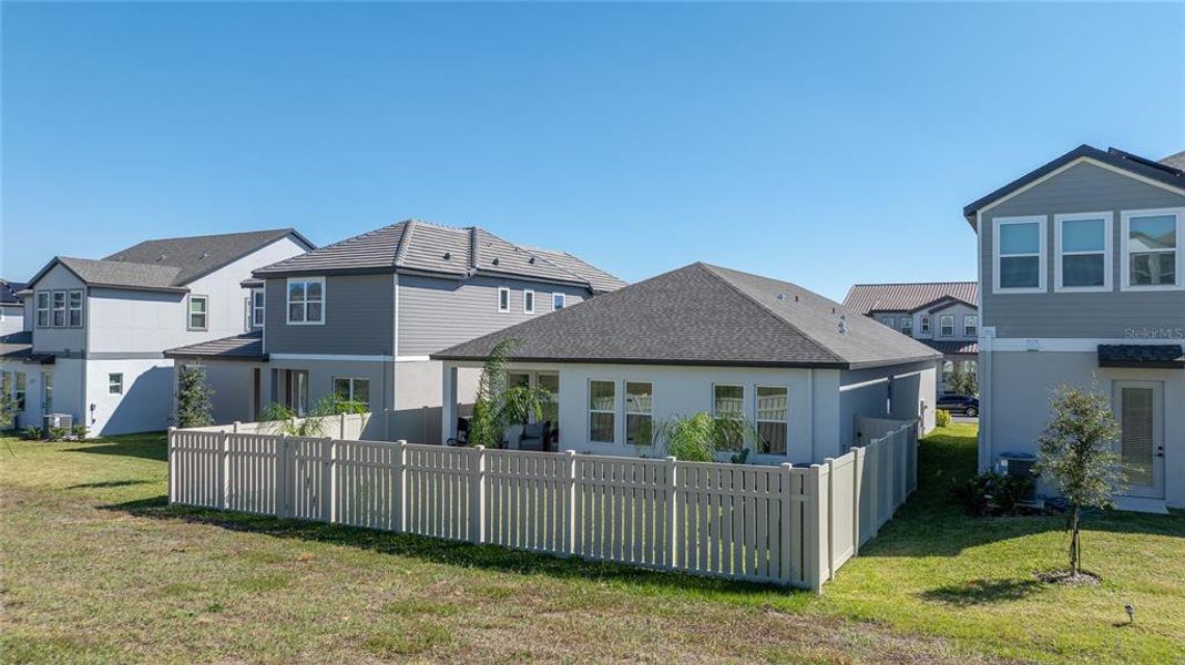 Exterior details and patio area of a home in Silverleaf Reserve, Winter Garden (Image 23).