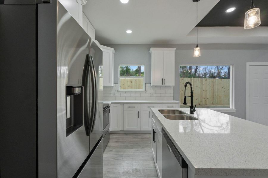 Furnished interior view inside a new home in , Willis (Image 7).