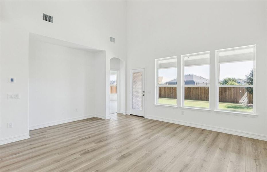 Expansive gathering room bathed in natural sunlight Expansive gathering room bathed in natural sunlight
