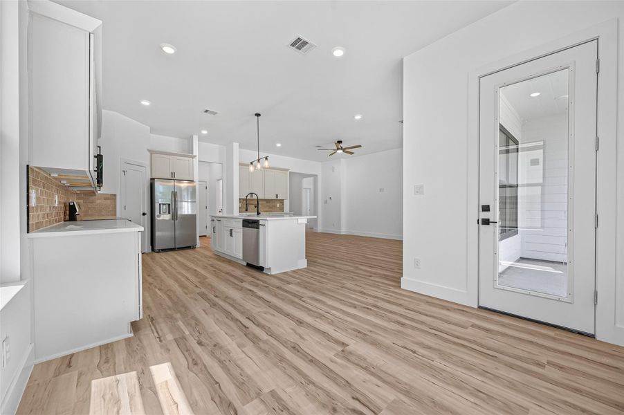 Furnished interior view inside a new home in , Conroe (Image 11).