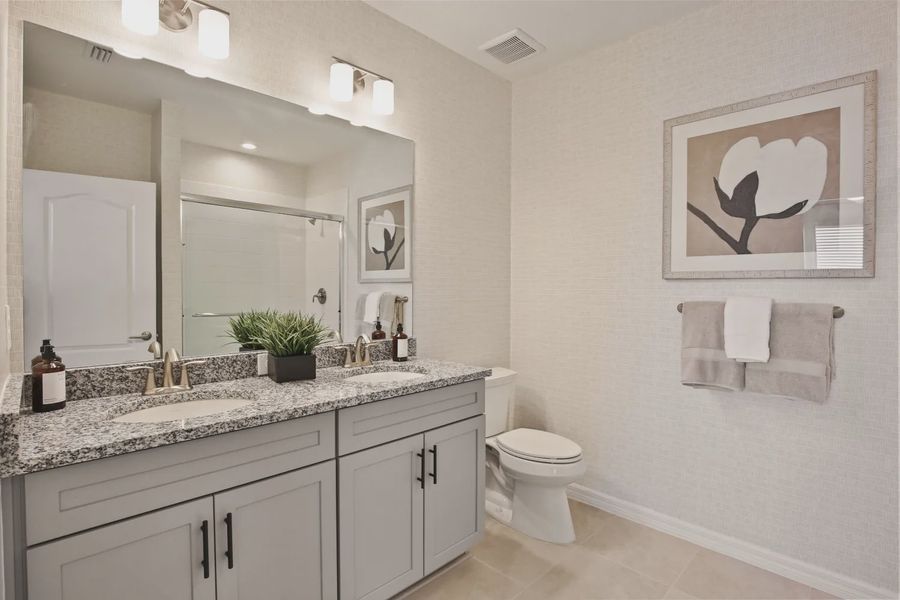 Representative furnished interior of a home built from the Morgan by Neal Communities in SkySail, Naples (Image 11).