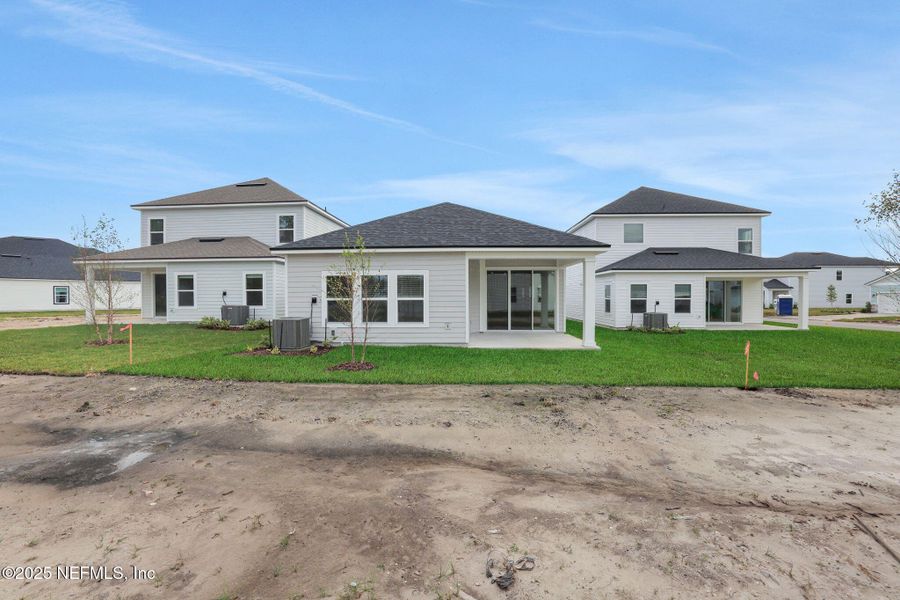 Exterior details and patio area of a home in Brook Forest, St. Augustine (Image 24).