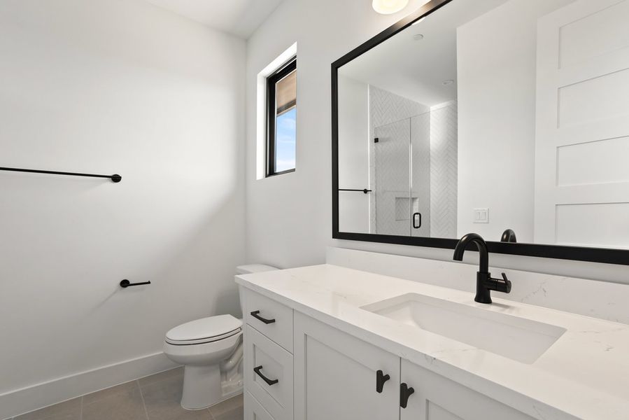 Furnished interior view inside a new home in Milky Way at River Place, Austin (Image 12).