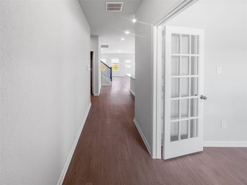 The Waring III- Foyer into Study with French doors. Sample image for illustration; upgrades, options, and colors may vary. The Waring III- Foyer into Study with French doors. Sample image for illustration; upgrades, options, and colors may vary.