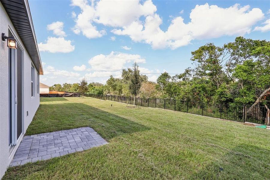 Exterior details and patio area of a home in Crosswinds - Signature Series, Haines City (Image 19).