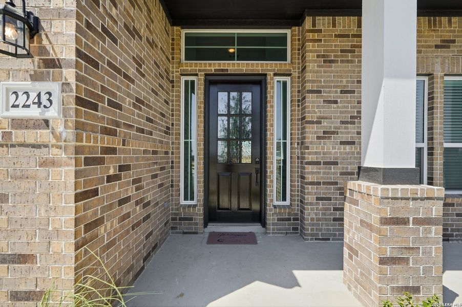Exterior details and patio area of a home in Prominence Urban, San Antonio (Image 4).