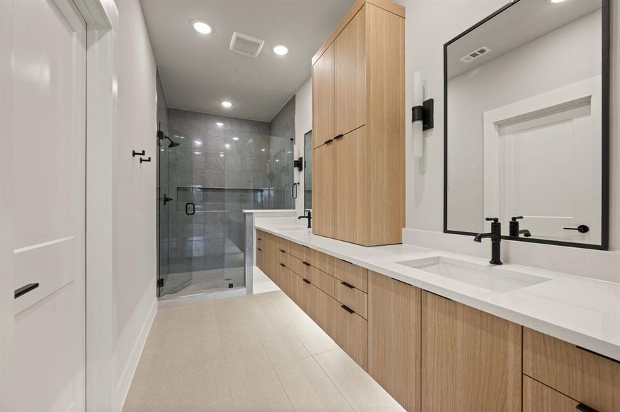 No shortage of space, storage or style in this over the top owner's bath!