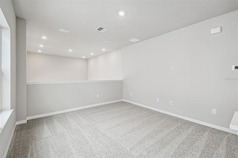 Spacious, unfurnished interior of a new home in Weslyn Park in Sunbridge 34', St. Cloud (Image 47).