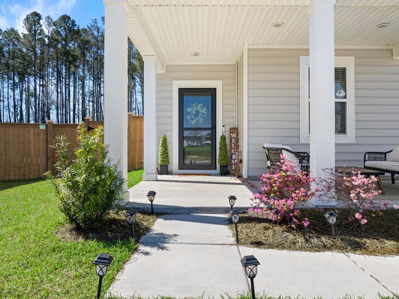 Exterior details and patio area of a home in Sweetgrass at Summers Corner, Summerville (Image 3).