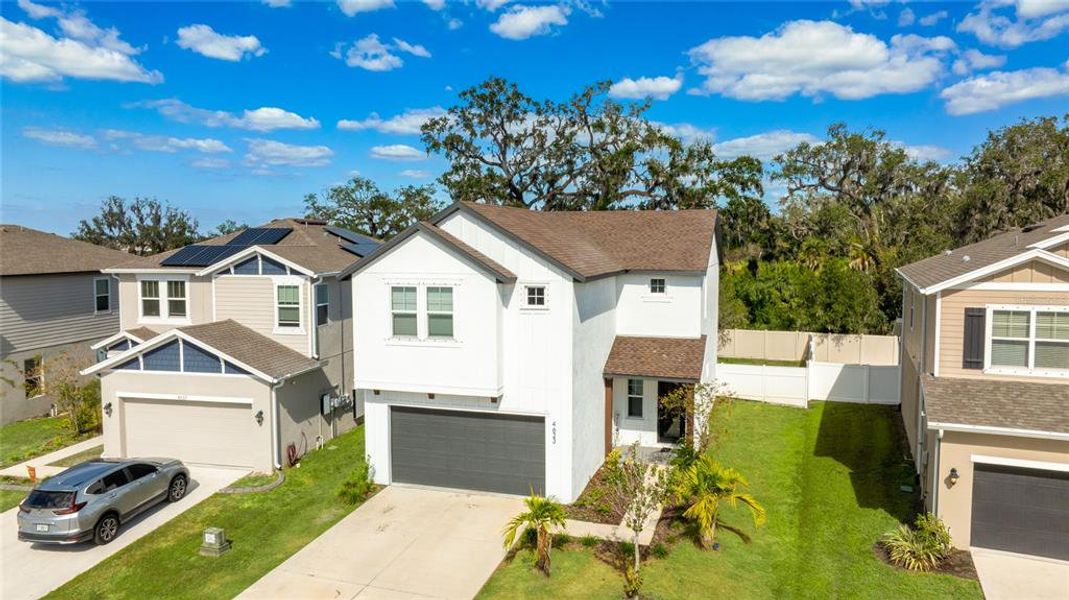 Front exterior of a new home in , Palmetto, FL, highlighting curb appeal (Image 1).