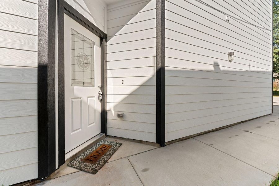 Exterior details and patio area of a home in , Willis (Image 3). Exterior details and patio area of a home in , Willis (Image 3).