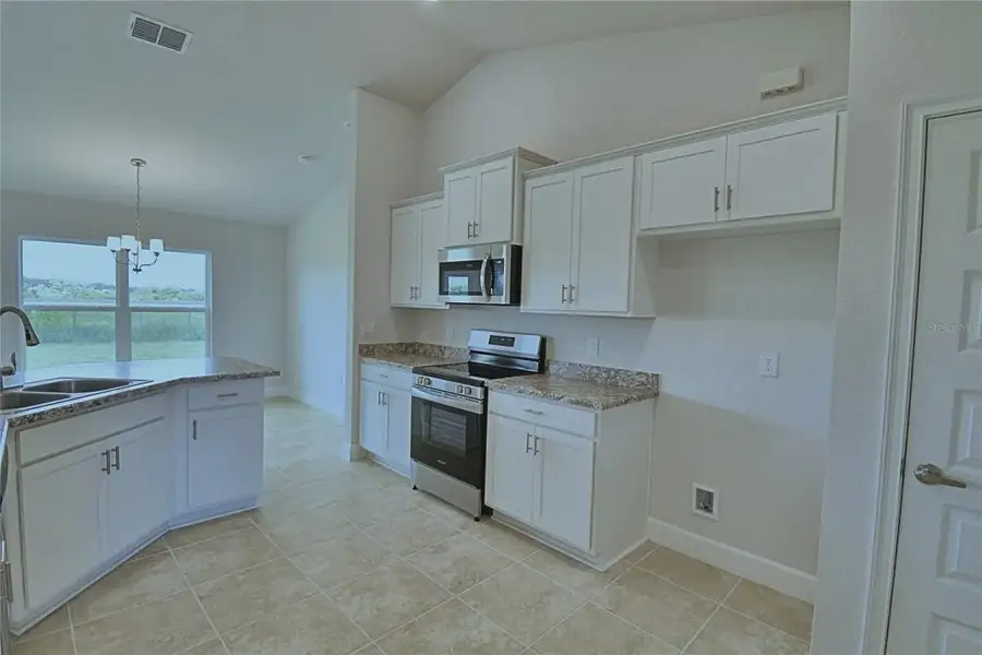 Furnished interior view inside a new home in Cadence Crossing, Auburndale (Image 4).