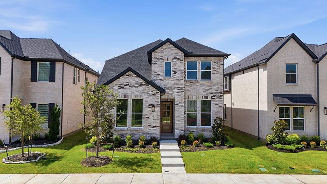 Front exterior of a new home in Light Farms Brenham - 40' Lots, Celina, TX, highlighting curb appeal (Image 24).