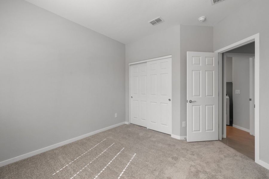 Spacious, unfurnished interior of a new home in Blossom Rock, Apache Junction (Image 18).