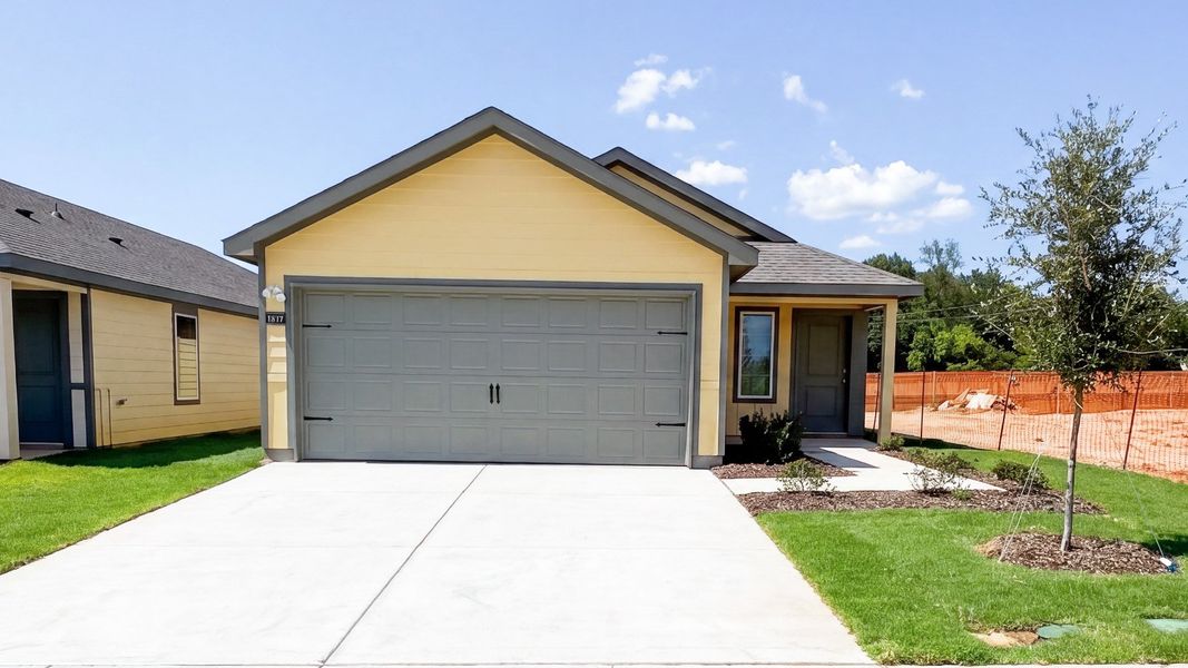 Front exterior of a new home in Blaire Lake, Tyler, TX, highlighting curb appeal (Image 1). Front exterior of a new home in Blaire Lake, Tyler, TX, highlighting curb appeal (Image 1).
