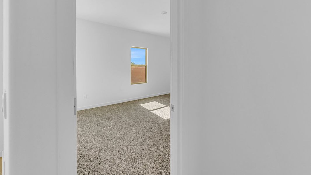 Spacious, unfurnished interior of a new home in The Oasis at Rocking K, Vail (Image 43).