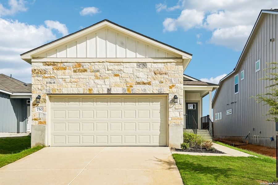Front exterior of a new home in Highland Ridge, San Antonio, TX, highlighting curb appeal (Image 20). Front exterior of a new home in Highland Ridge, San Antonio, TX, highlighting curb appeal (Image 20).