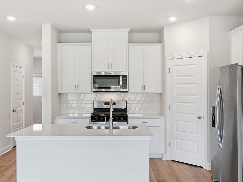 Furnished interior view inside a new home in Crossing at Abner Creek Townes, Greer (Image 4).