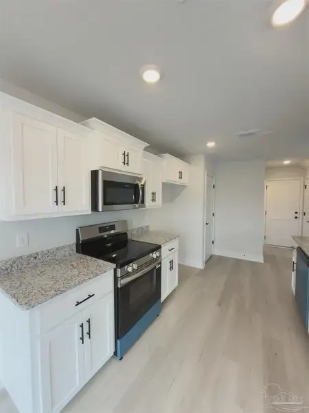 Furnished interior view inside a new home in Allison Acres, Cantonment (Image 5).