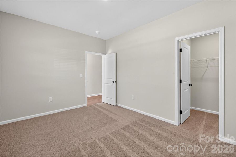 Spacious, unfurnished interior of a new home in Stagecoach Station, Gastonia (Image 24).