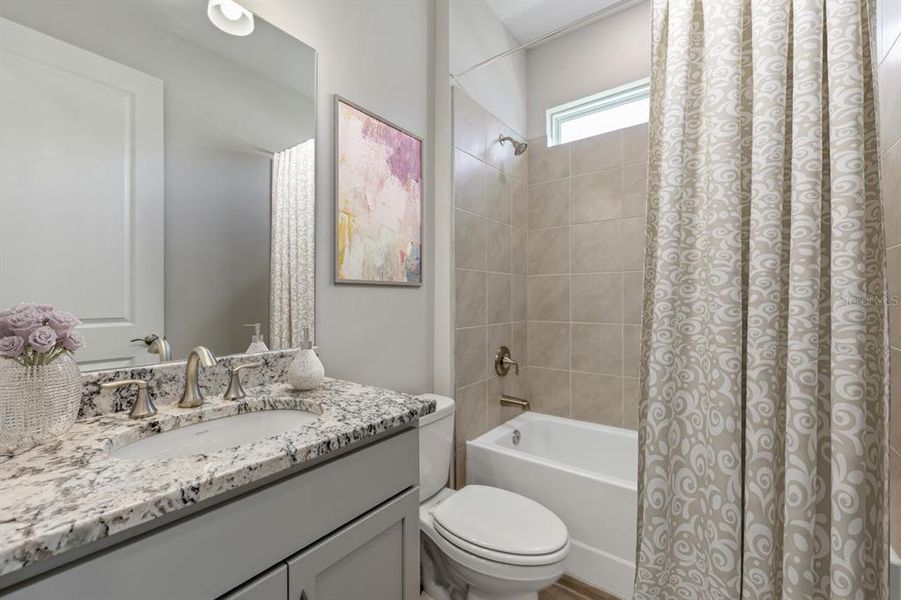 Furnished interior view inside a new home in Coral Lakes - Tradition & Express, Punta Gorda (Image 13).