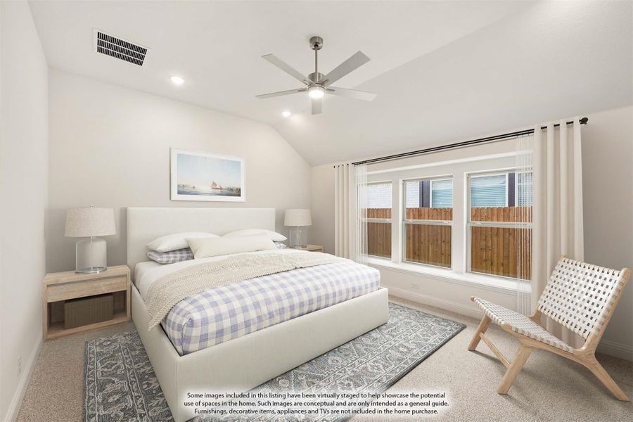 Bedroom with vaulted ceiling, ceiling fan, carpet flooring, and large windows with white curtains