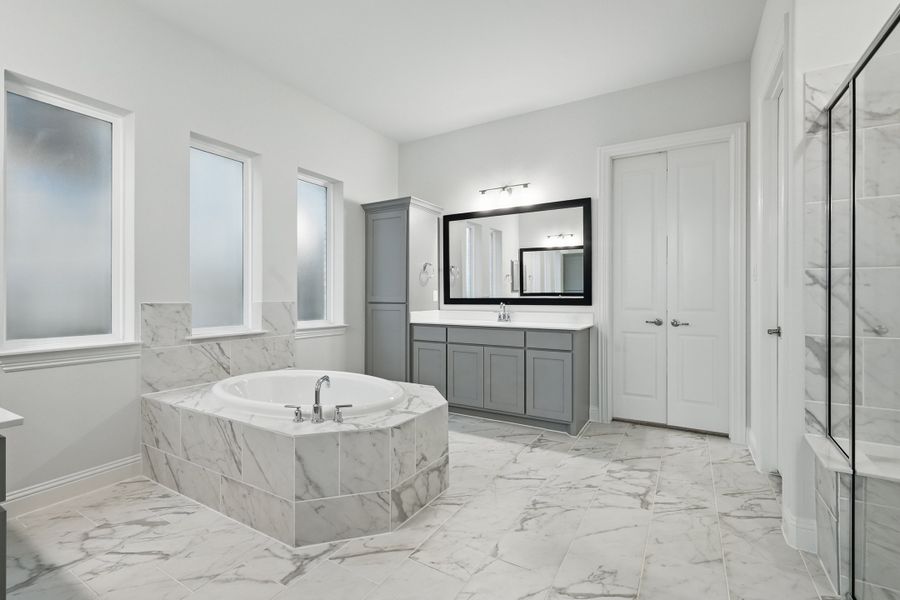 Representative furnished interior of a home built from the Classic Series - Dartmouth by DRB Homes in Oaks at San Gabriel, Georgetown (Image 16).