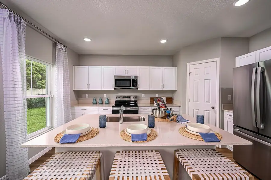 Furnished interior view inside a new home in Scenic Terrace, Haines City (Image 4).