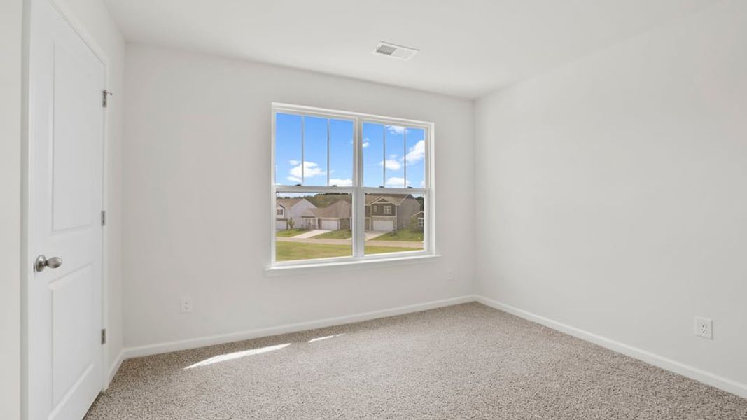 Spacious, unfurnished interior of a new home in Durbin Meadows Traditions, Fountain Inn (Image 31).