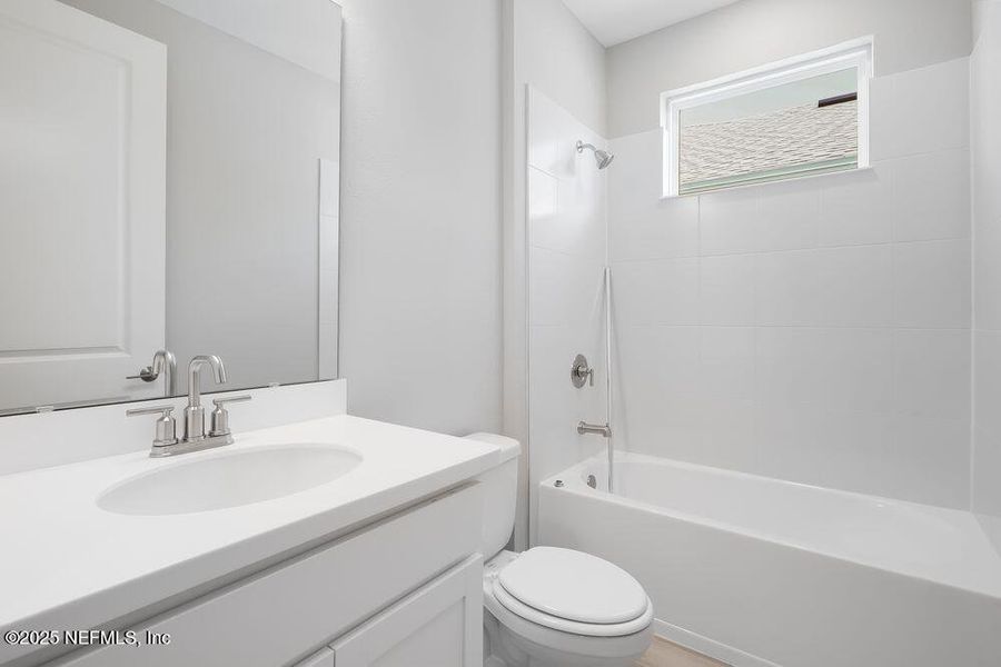 Furnished interior view inside a new home in Colbert Landings, Palm Coast (Image 6).