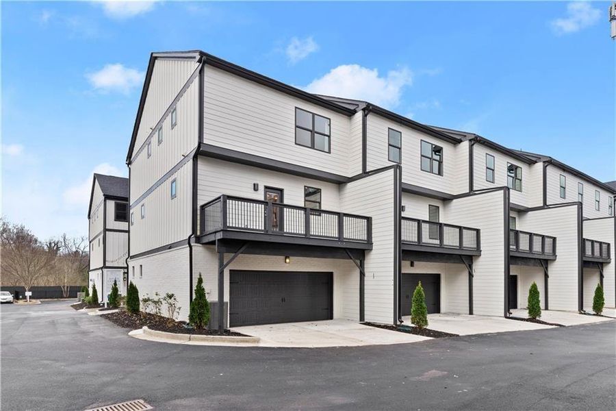 Front exterior of a new home in One Riverside West, Atlanta, GA, highlighting curb appeal (Image 21).