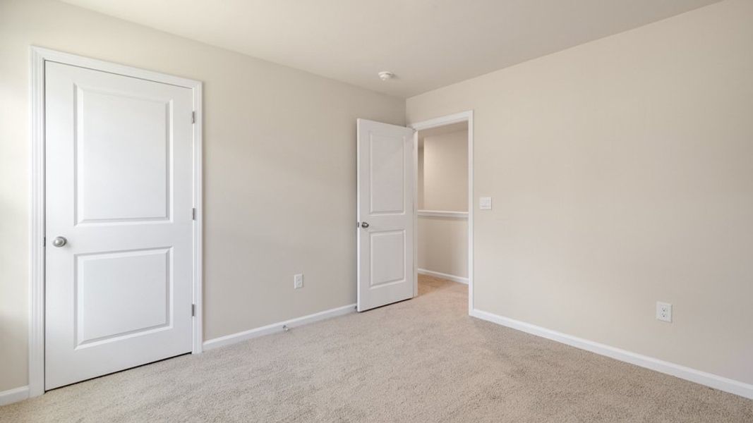 Spacious, unfurnished interior of a new home in Villa Grande, Winterville (Image 27).