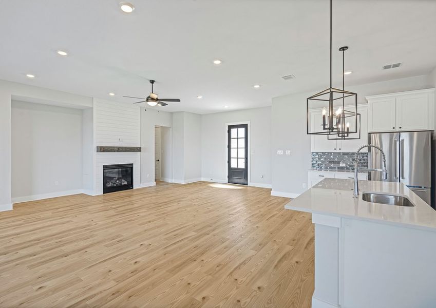 The living room has an electric fireplace. The living room has an electric fireplace.