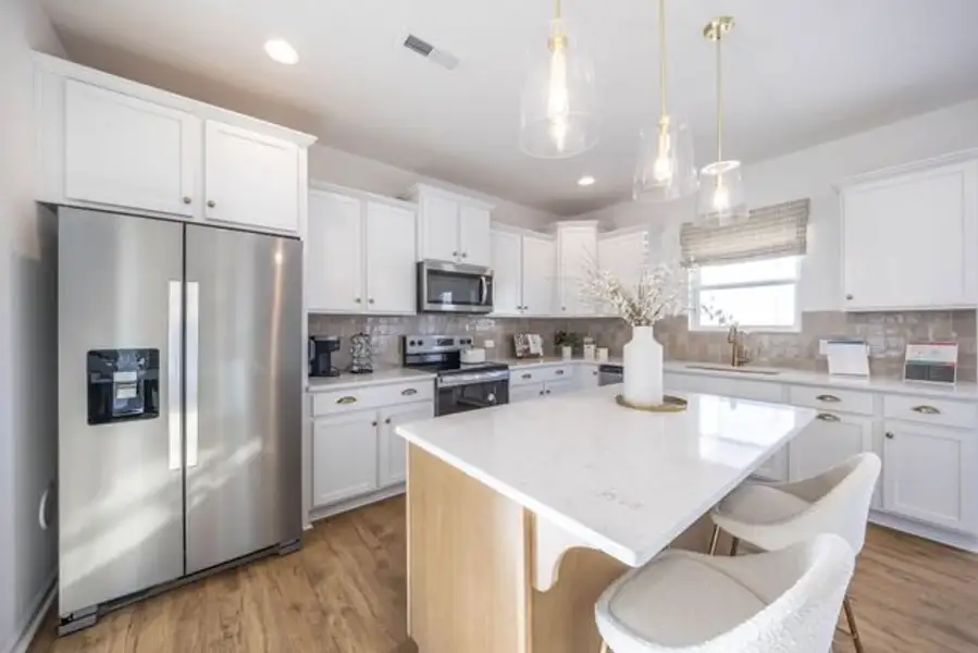 Representative furnished interior of a home built from the Hudson by True Homes in Harpers Landing, Walkertown (Image 3).